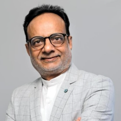 Dr. Hasmukh Adhia, IAS (Retd.)